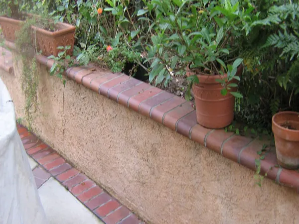 Exterior fence cleaning in progress