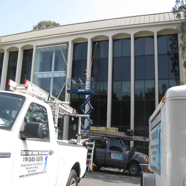 Building exterior washing with lift access equipment