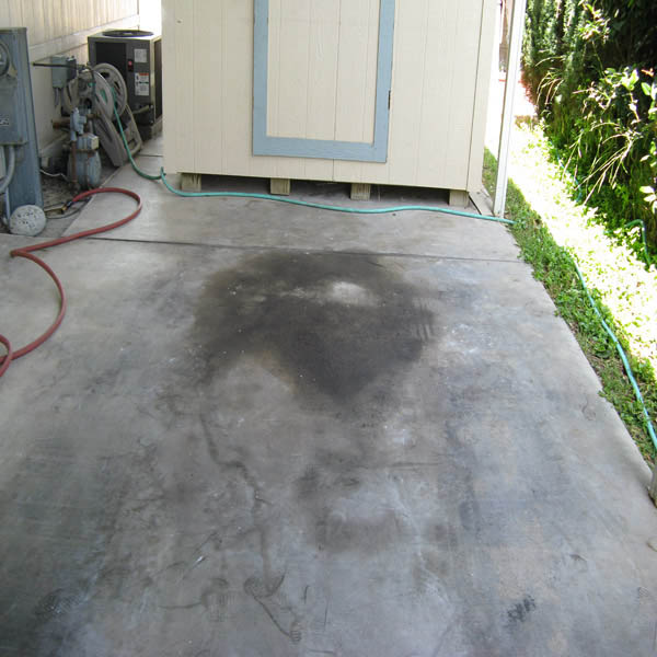 Oil stain removal and concrete cleaning result