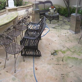 Patio hardscape before pressure washing service