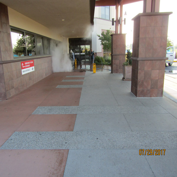 Commercial walkway after pressure washing service