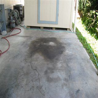 Targeted treatment setup for an oil-stained concrete driveway