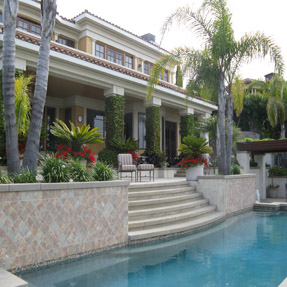 Large home exterior prepared for house washing service