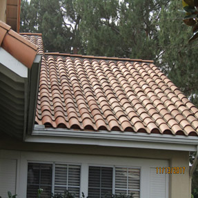 Tile roof cleaning result after roof debris and stain removal
