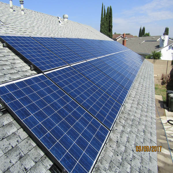 Residential solar panel cleaning on a roof